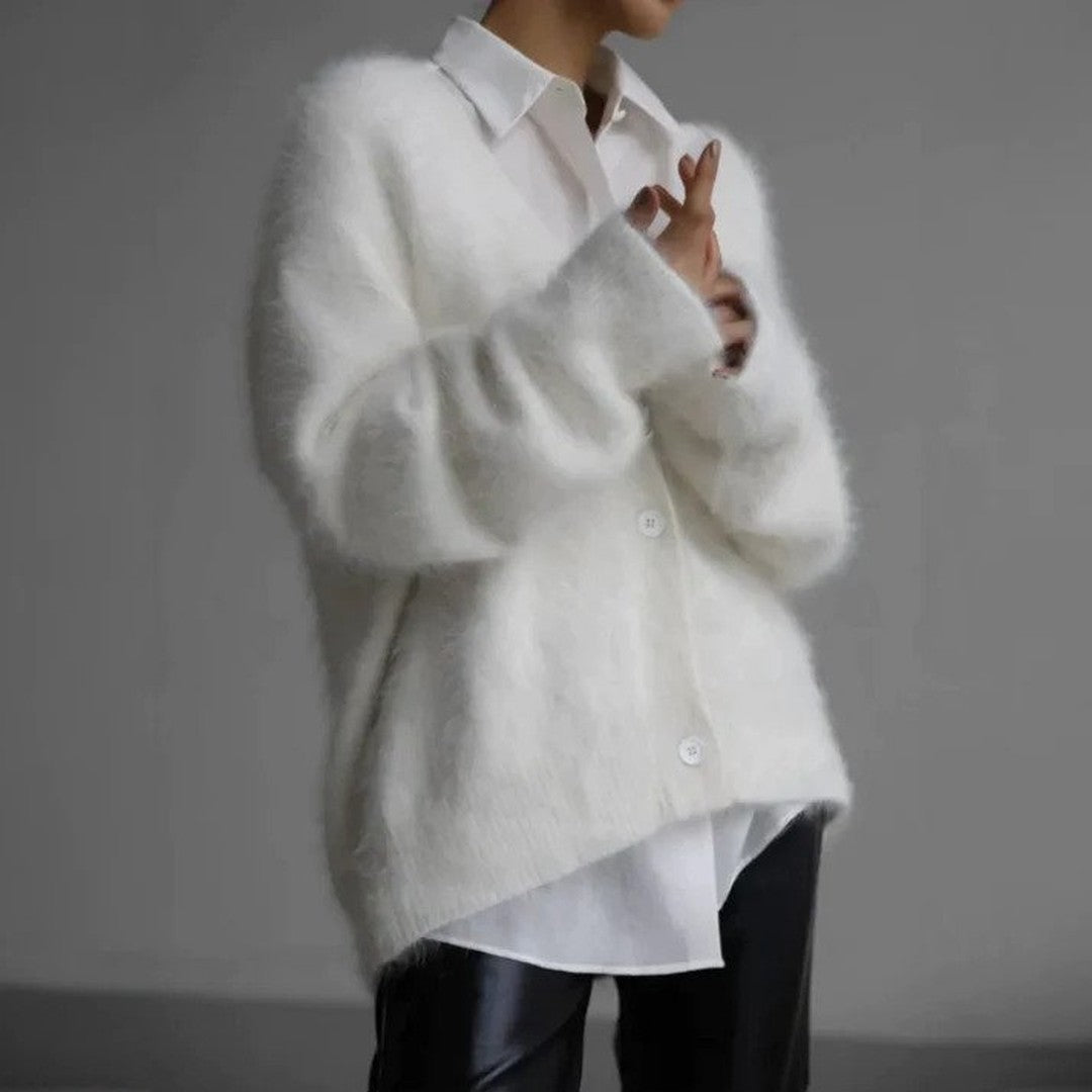 Woman wearing the Celeste women's knit elegant cardigan, side view