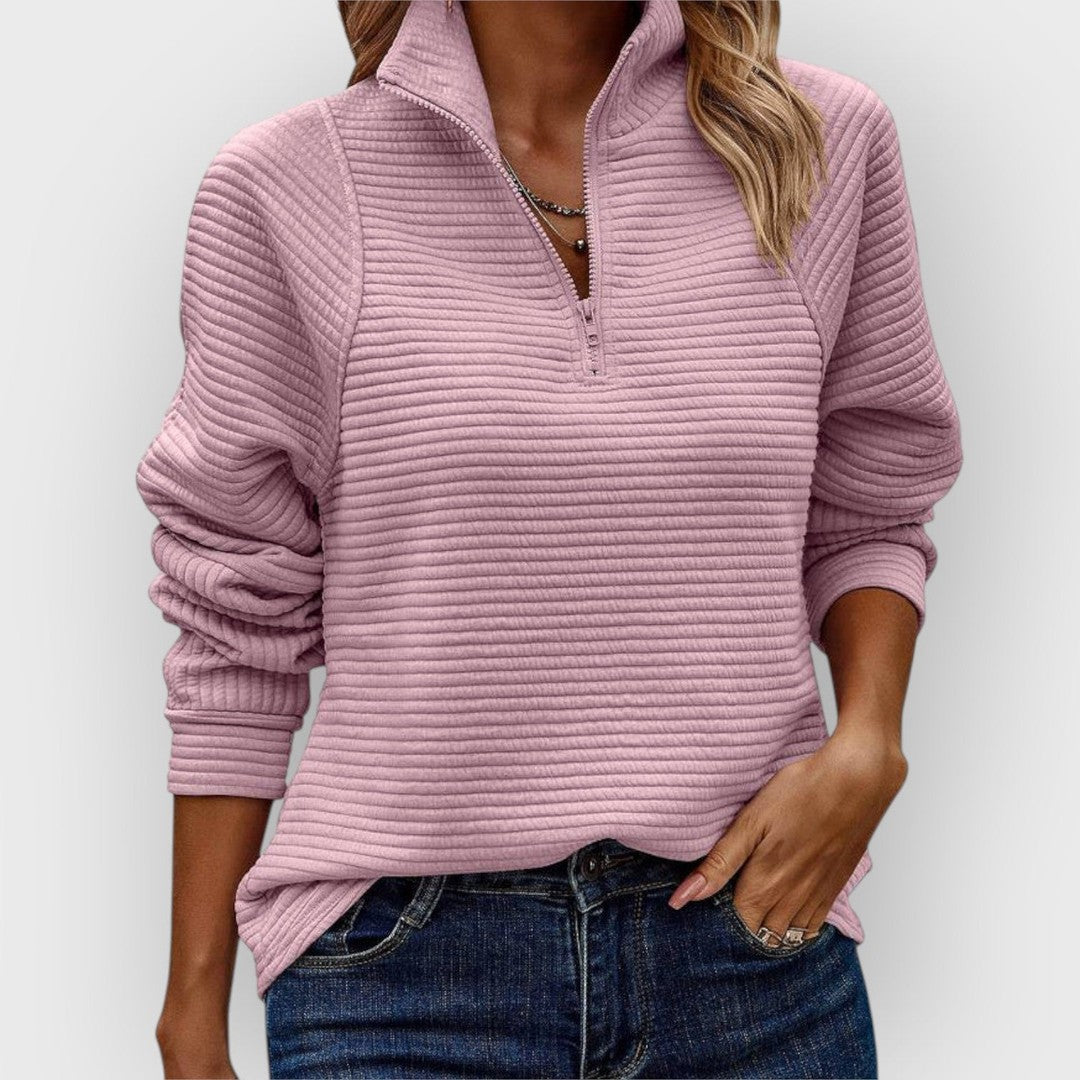 Woman wearing the Claire women's sweater, front view