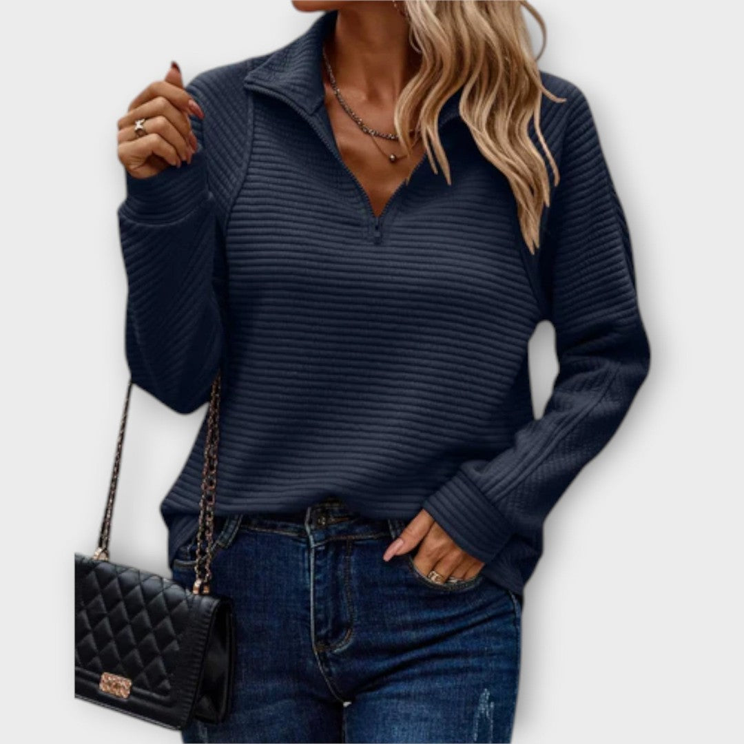 Woman wearing the Claire women's sweater, model view