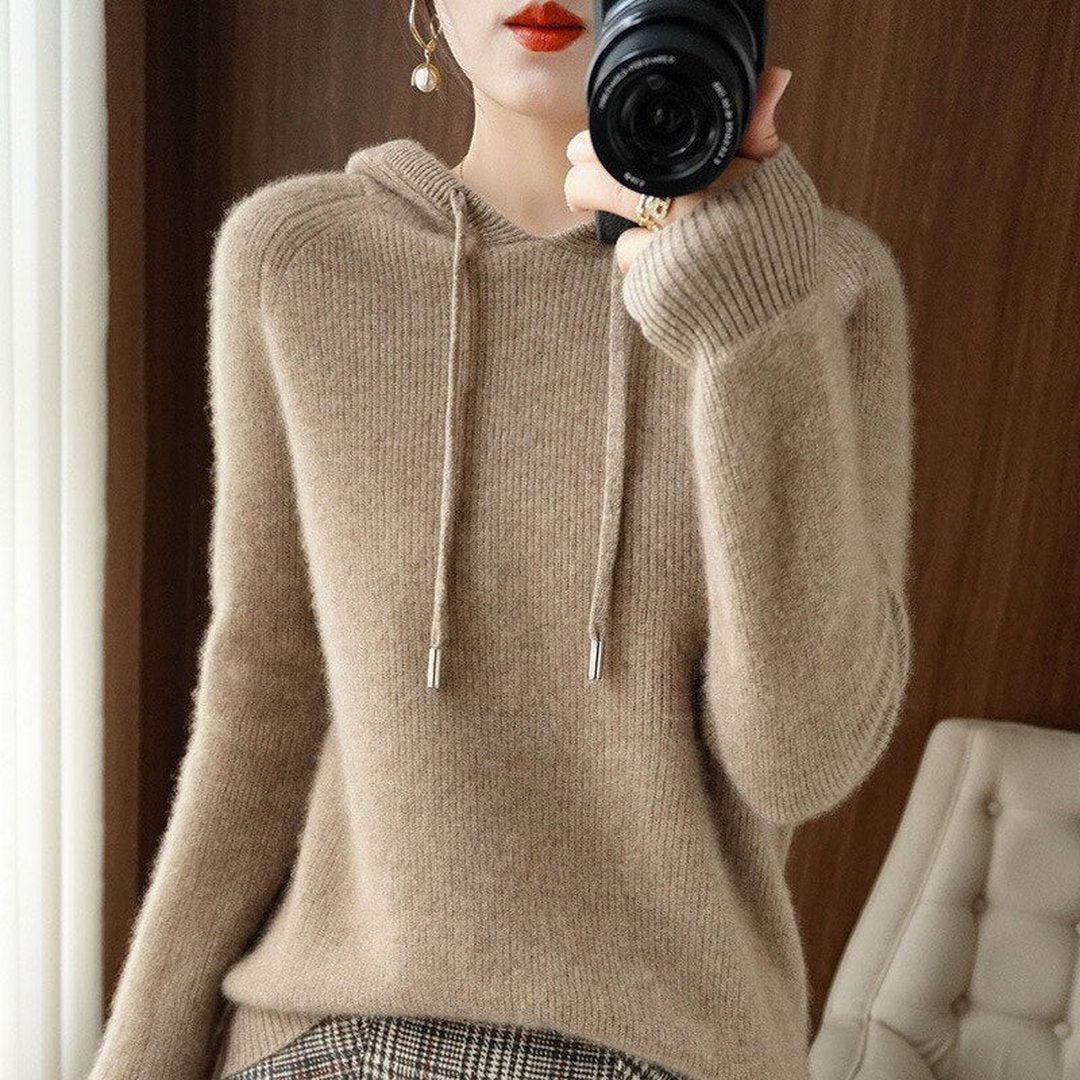 Woman wearing the Cora women's hooded cashmere hoodie, detail view