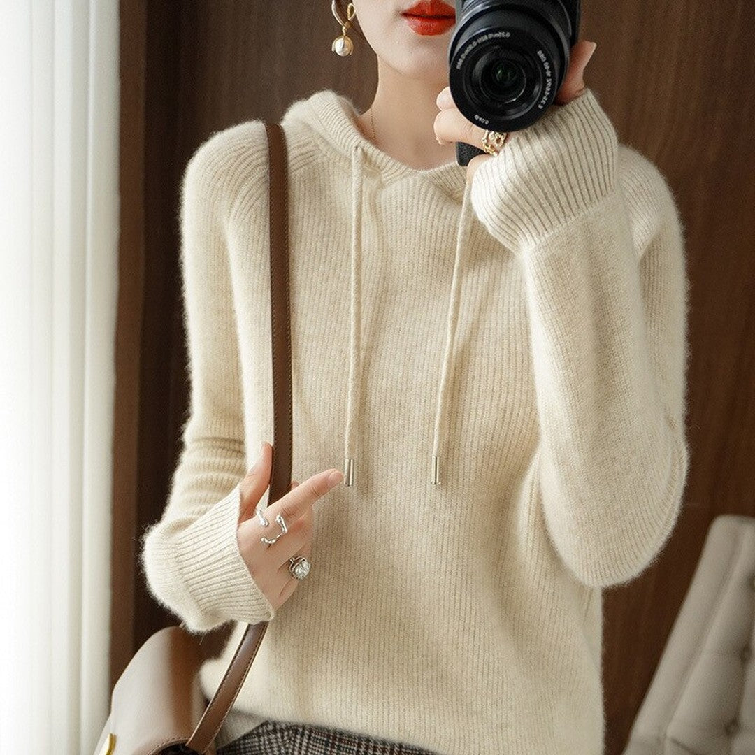 Woman wearing the Cora women's hooded cashmere hoodie, front view