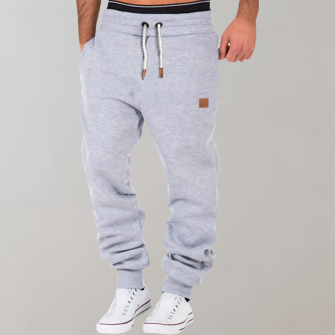 Man wearing the Cyrus men's joggers, back view