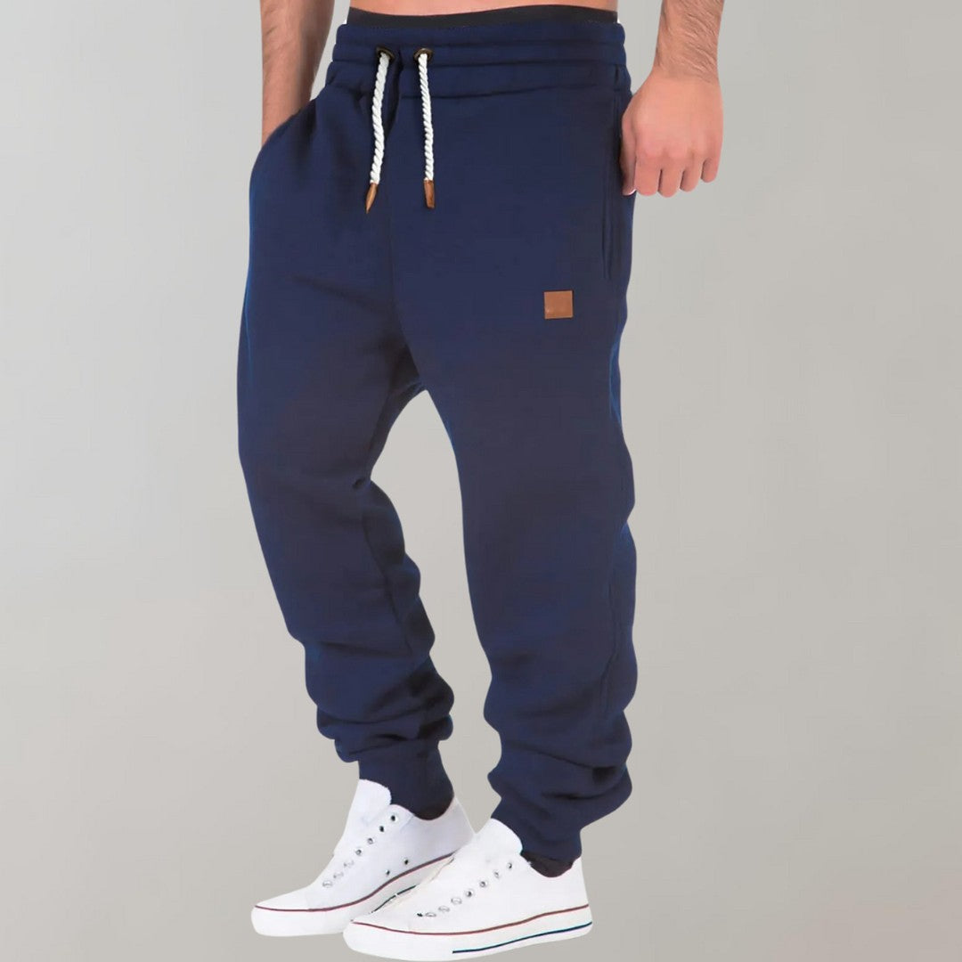 Man wearing the Cyrus men's joggers, front view