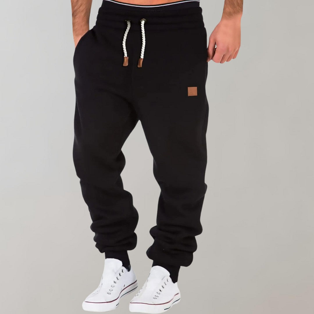 Man wearing the Cyrus men's joggers, model view