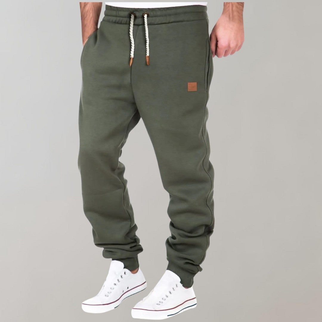 Man wearing the Cyrus men's joggers, side view