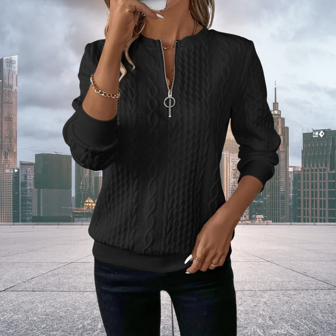 Woman wearing the Daisy women's elegant sweater, detail view