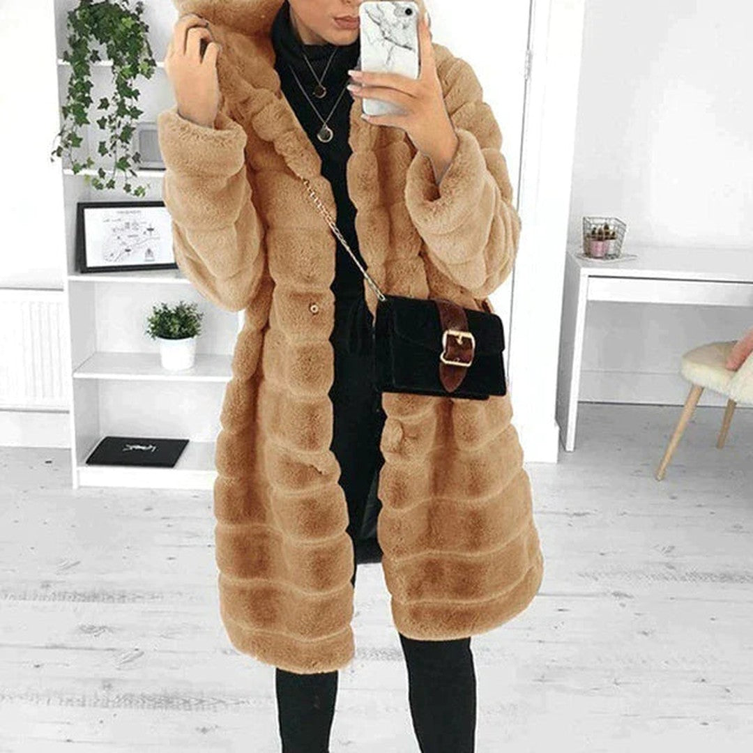 Woman wearing the Dalia women's coat, side view