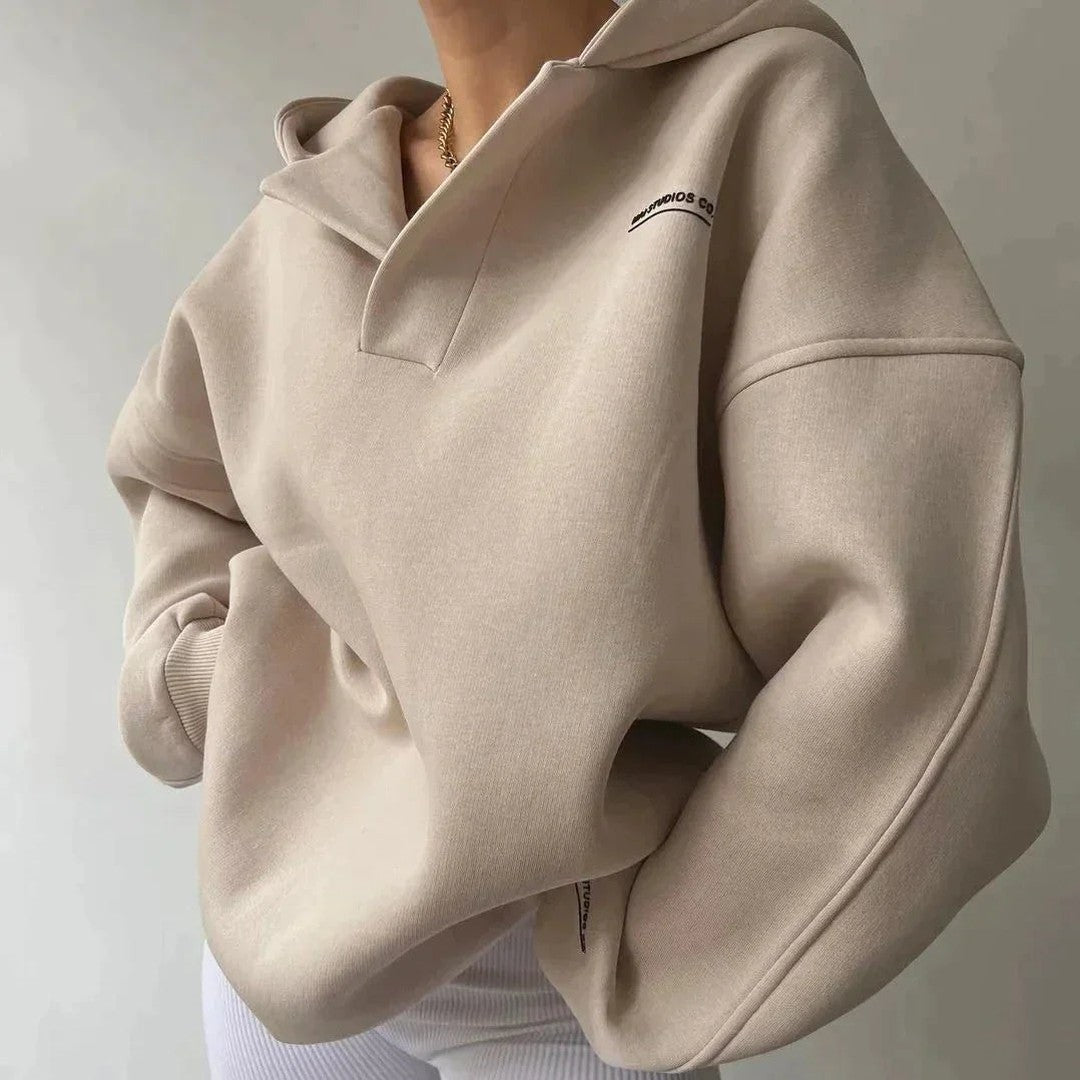 Woman wearing the Delphine women's sweater, detail view