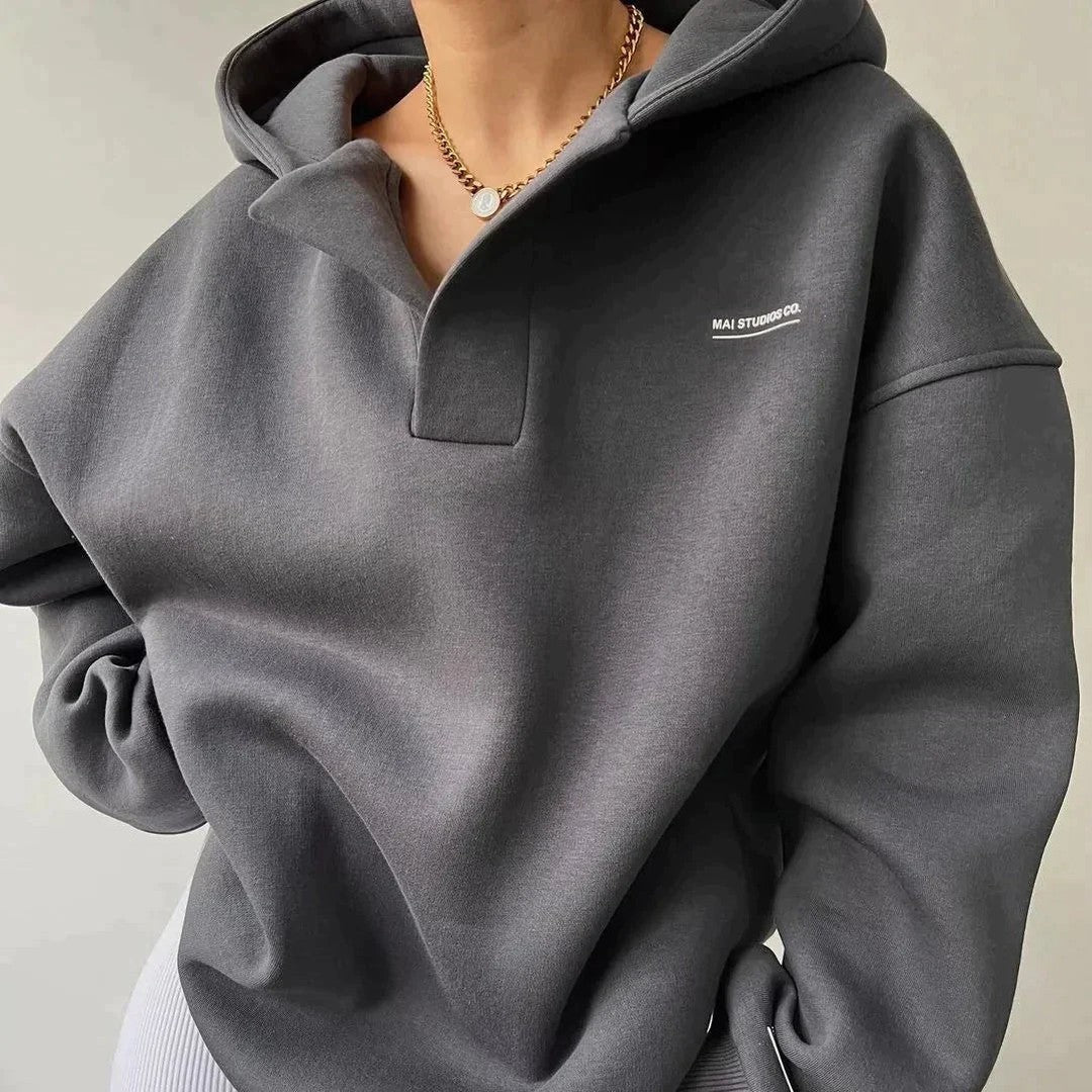Woman wearing the Delphine women's sweater, front view