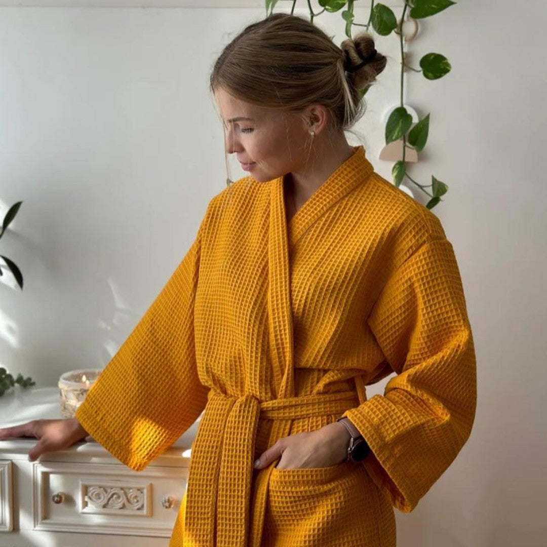 Woman wearing the Dinah women's cotton lightweight bathrobe, front view