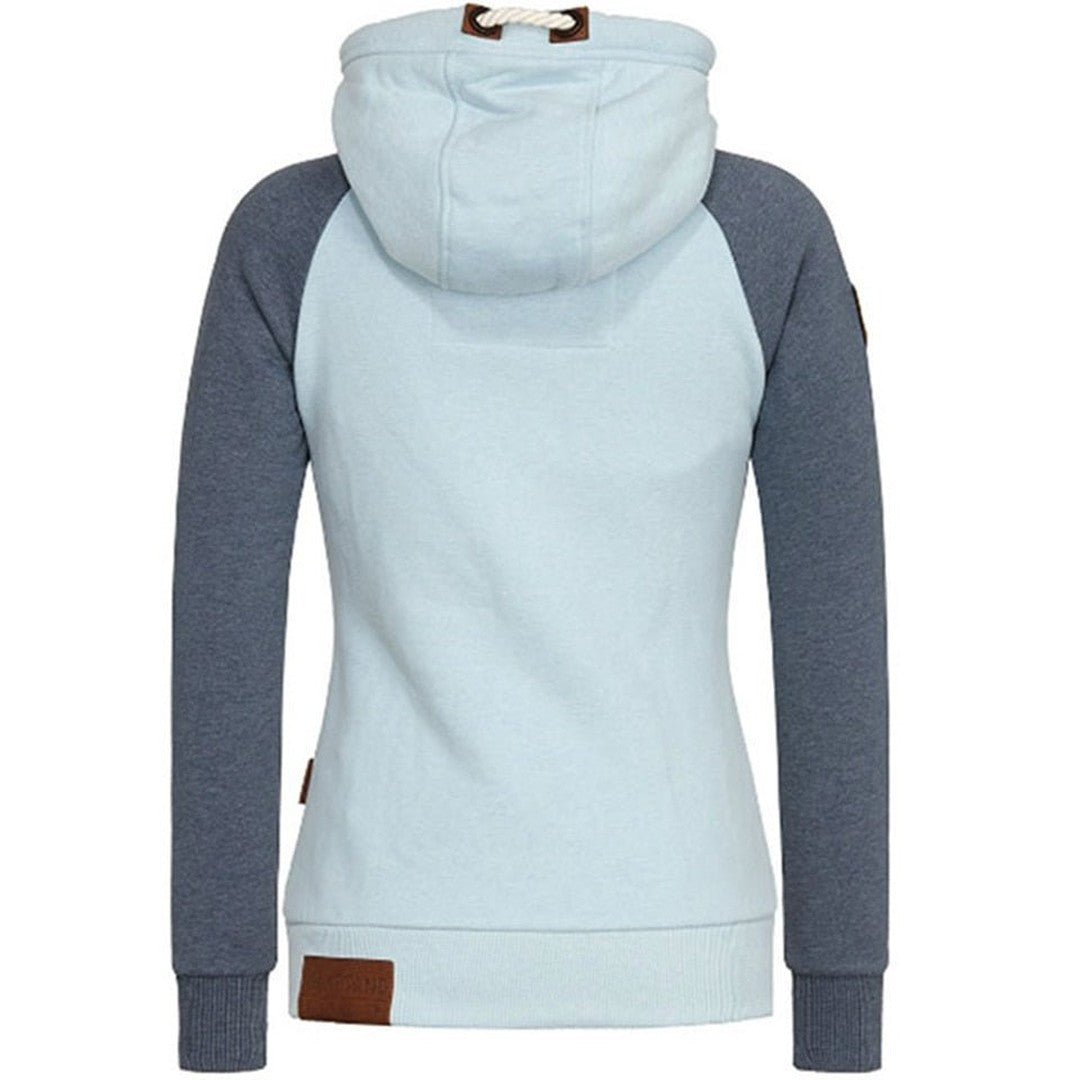 Woman wearing the Effie women's zip-up hoodie, side view