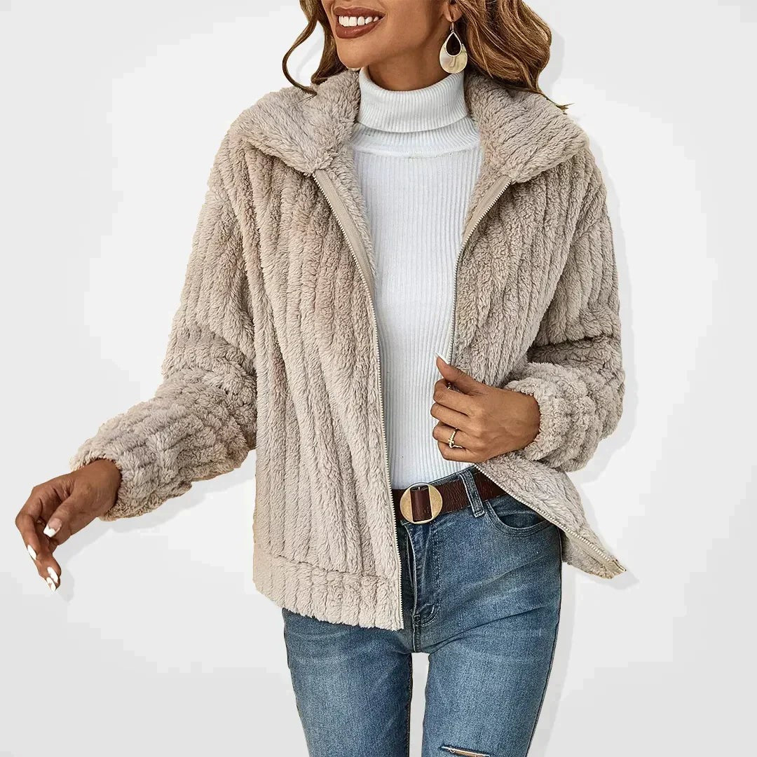 Woman wearing the Eira women's knit cardigan, front view