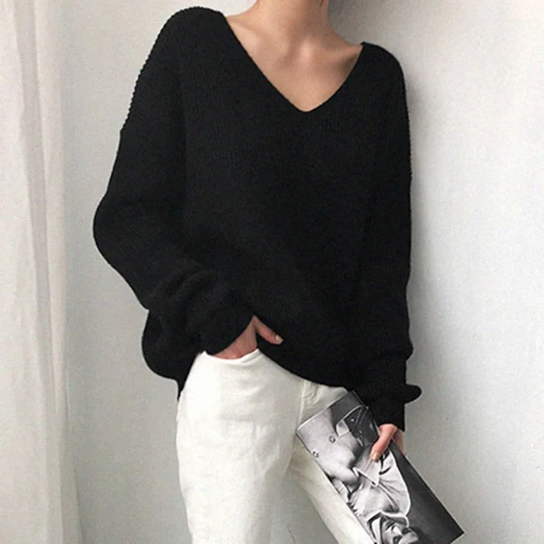 Woman wearing the Elise women's v-neck knit sweater, flatlay view