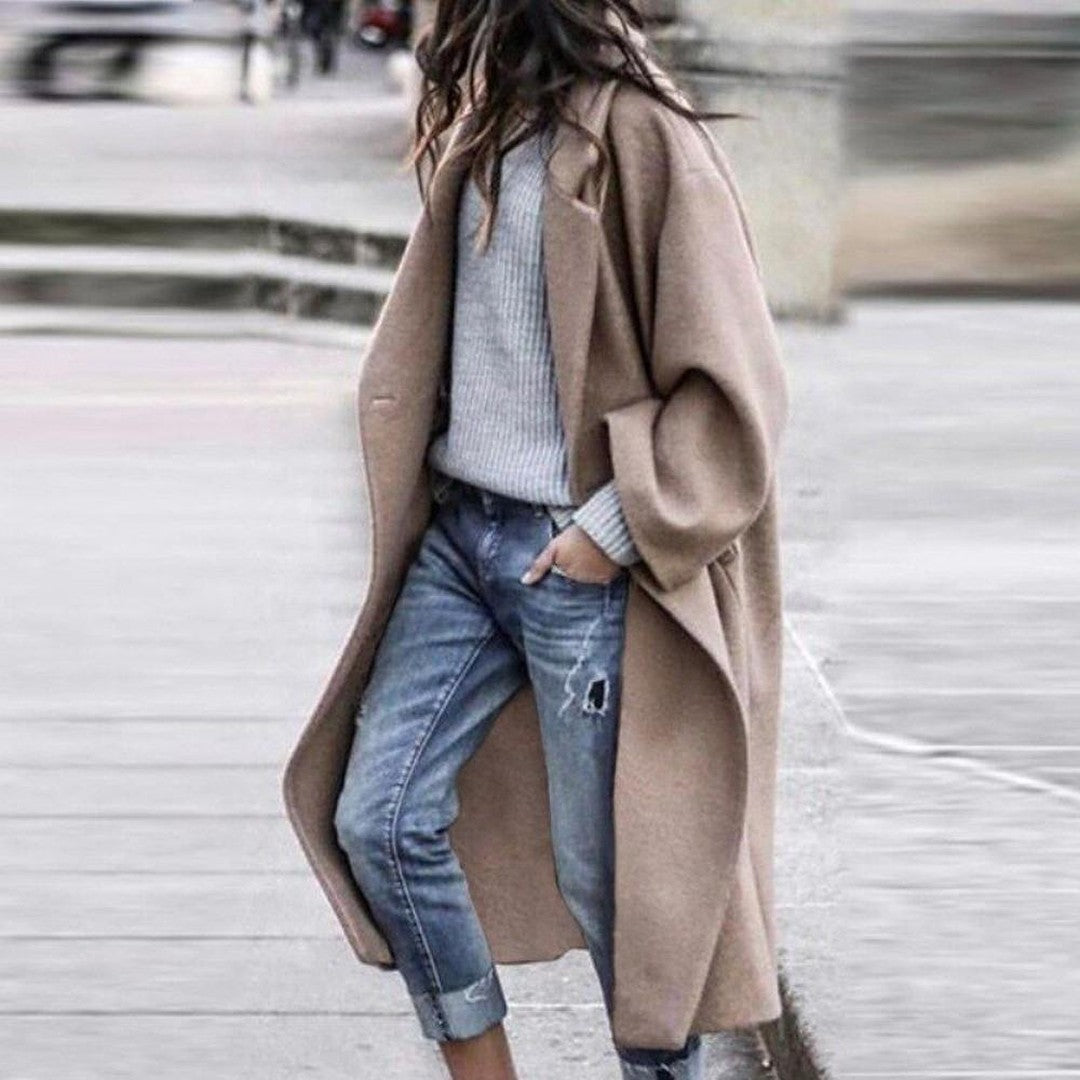 Woman wearing the Eliza women's elegant coat, back view