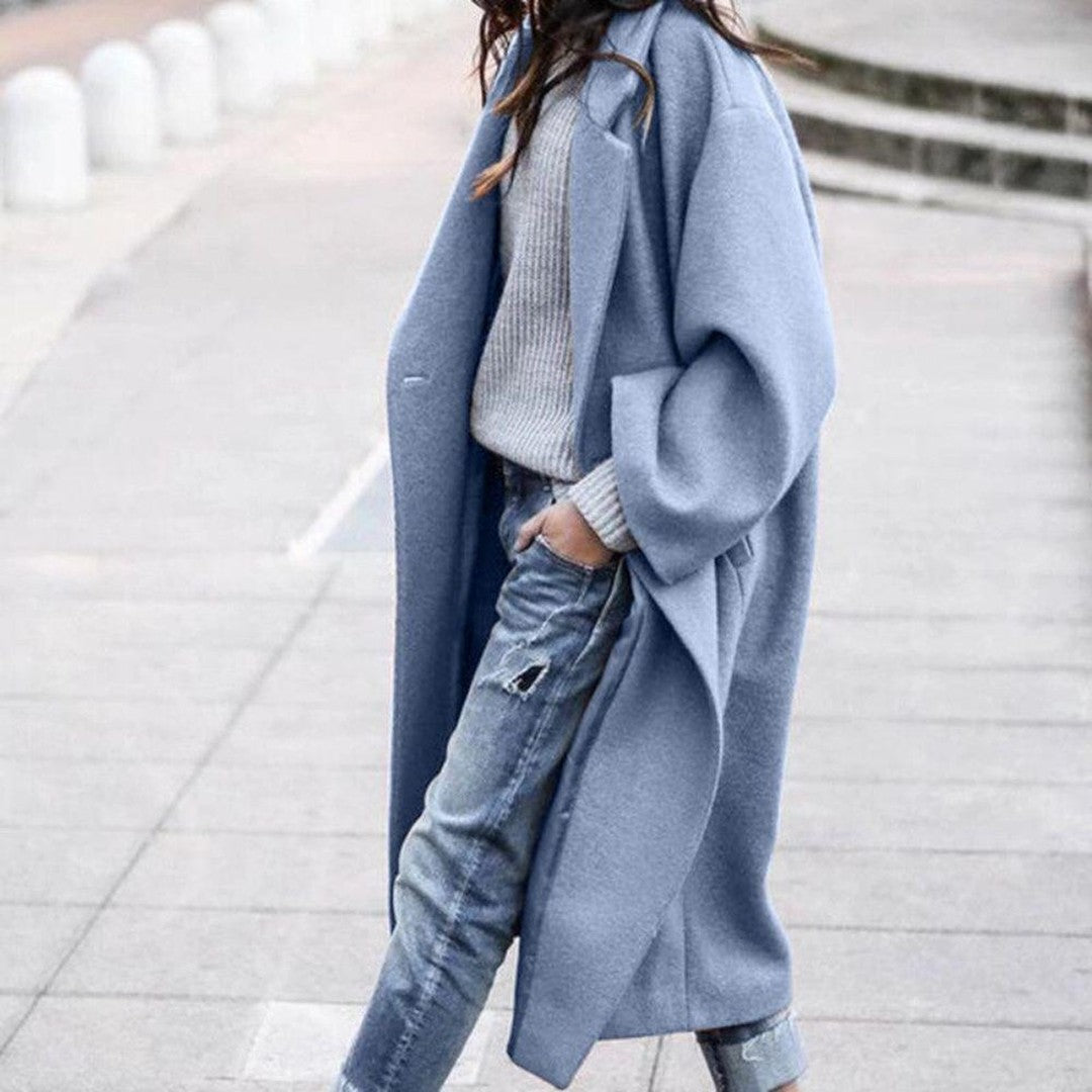 Woman wearing the Eliza women's elegant coat, front view