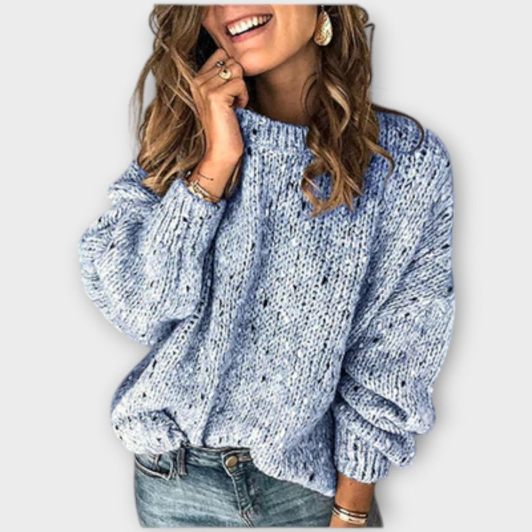 Woman wearing the Ella women's sweater, back view