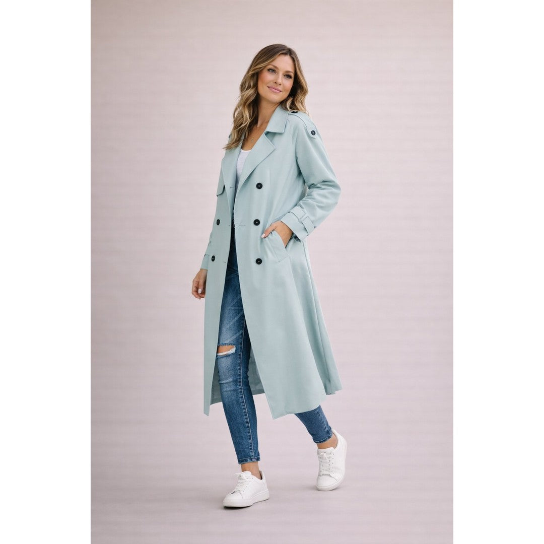 Woman wearing the Elsa women's casual polyester elegant trench coat in beige, model view