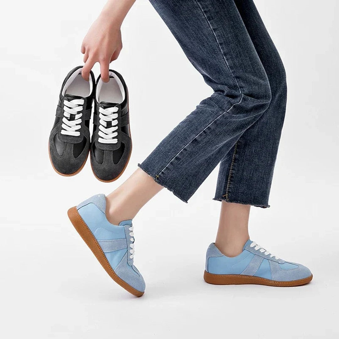 Woman wearing the Ember women's leather shoes, side view