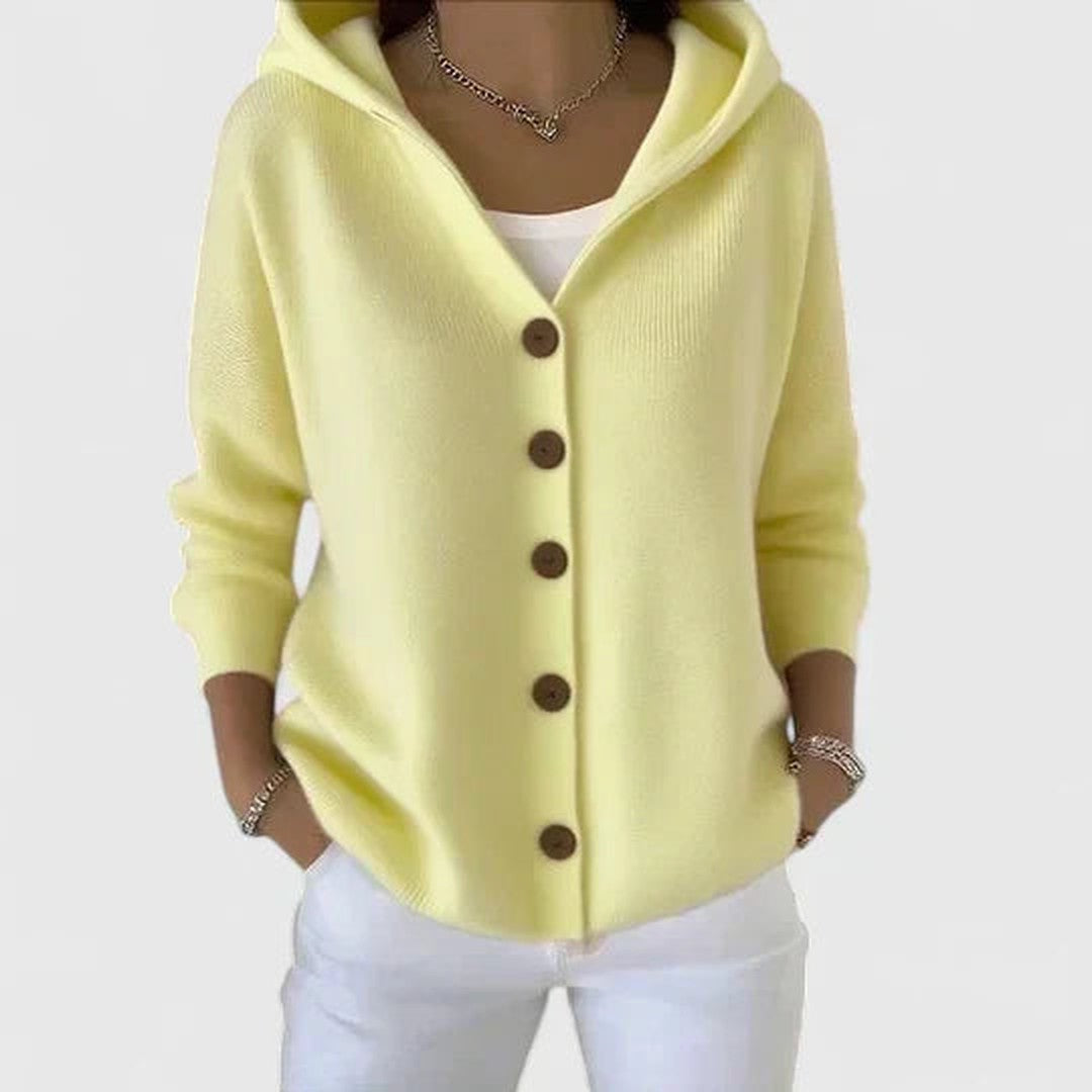 Woman wearing the Emery women's elegant cardigan, back view