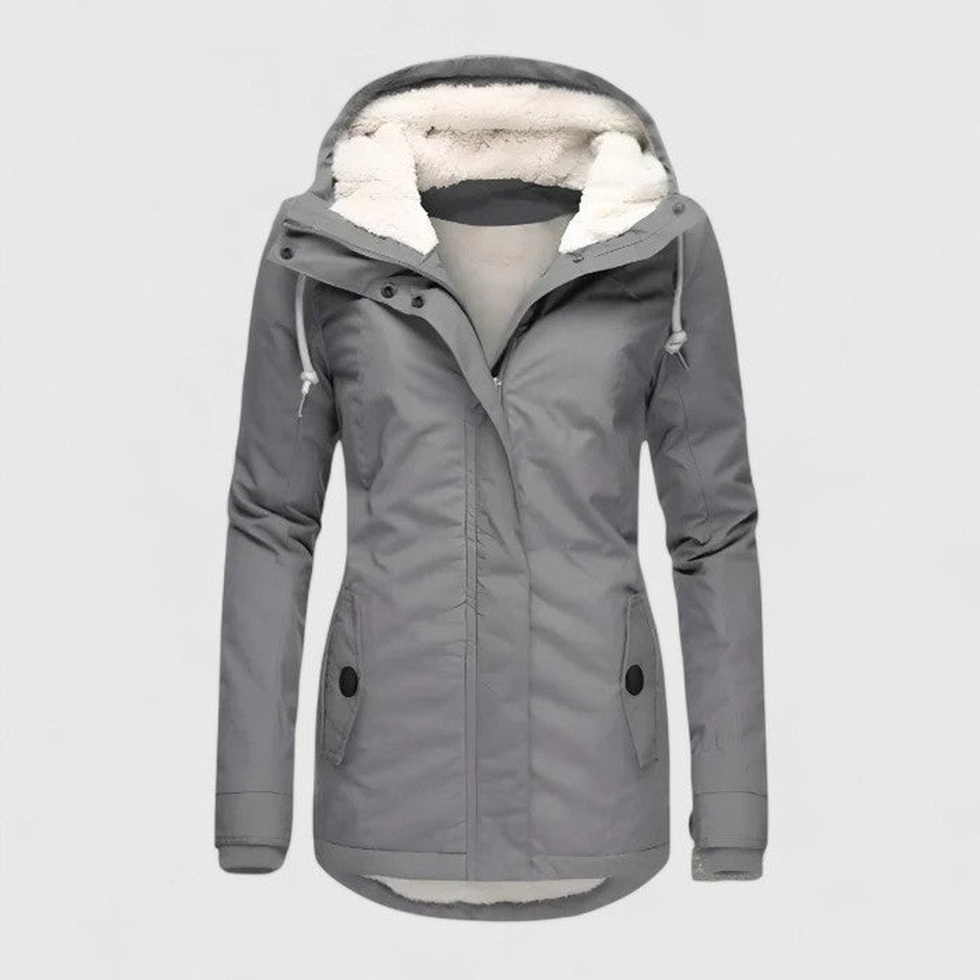 Woman wearing the Eva women's jacket, flatlay view