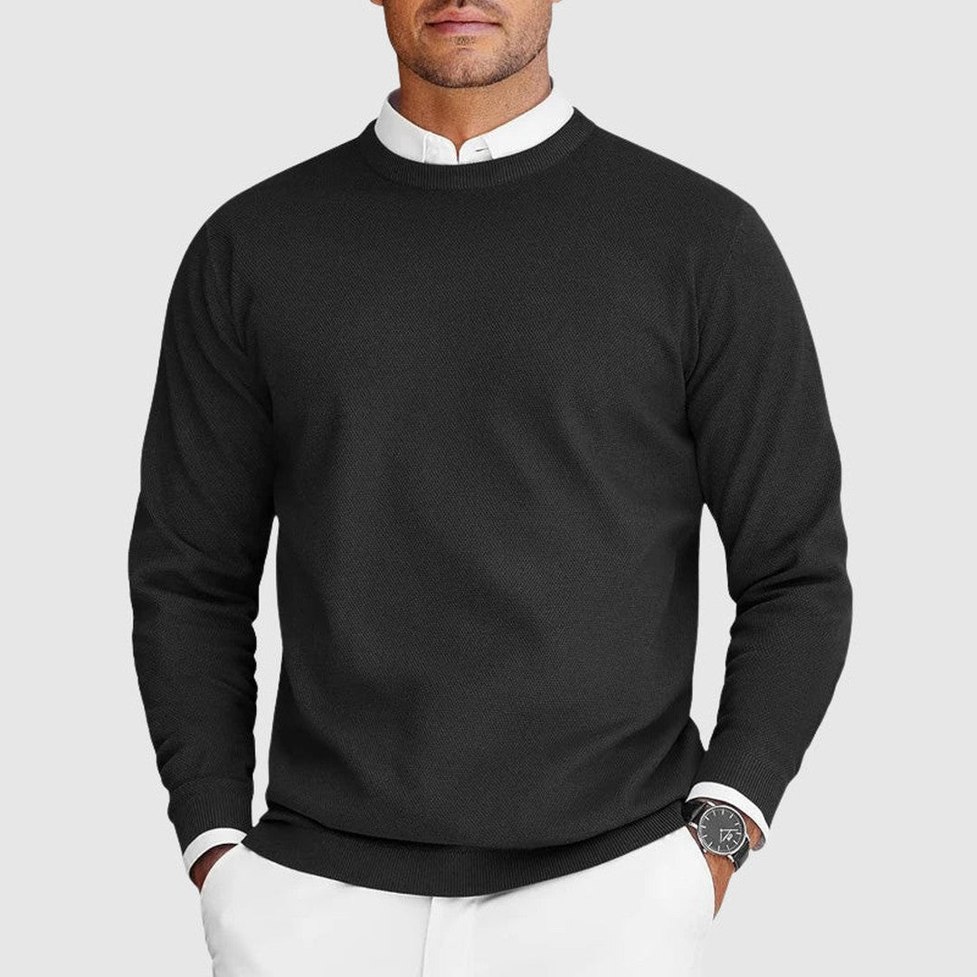 Man wearing the Ezra men's crewneck sweater, front view