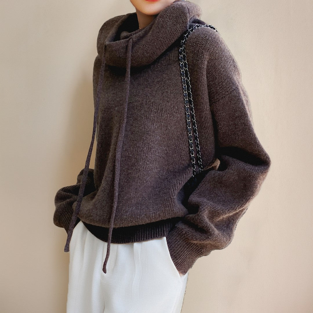 Woman wearing the Farrah women's oversized mock-neck knit sweater, detail view