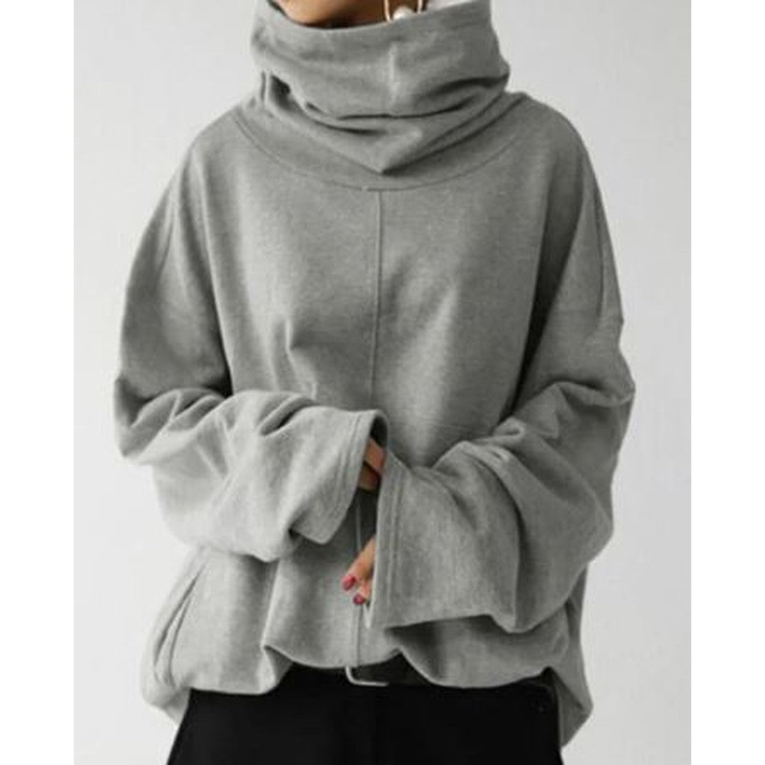 Woman wearing the Faye women's hoodie, back view
