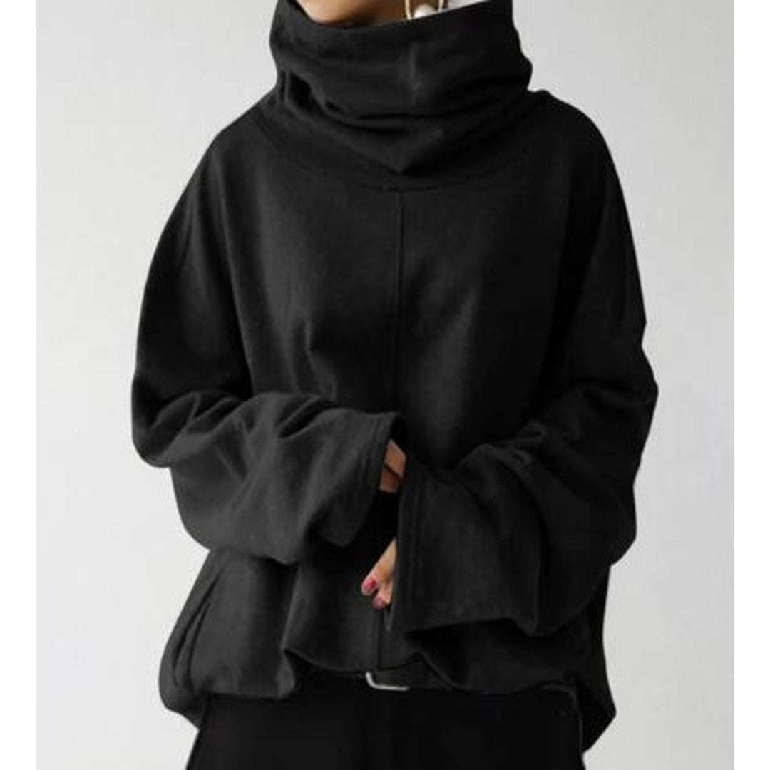 Woman wearing the Faye women's hoodie, side view