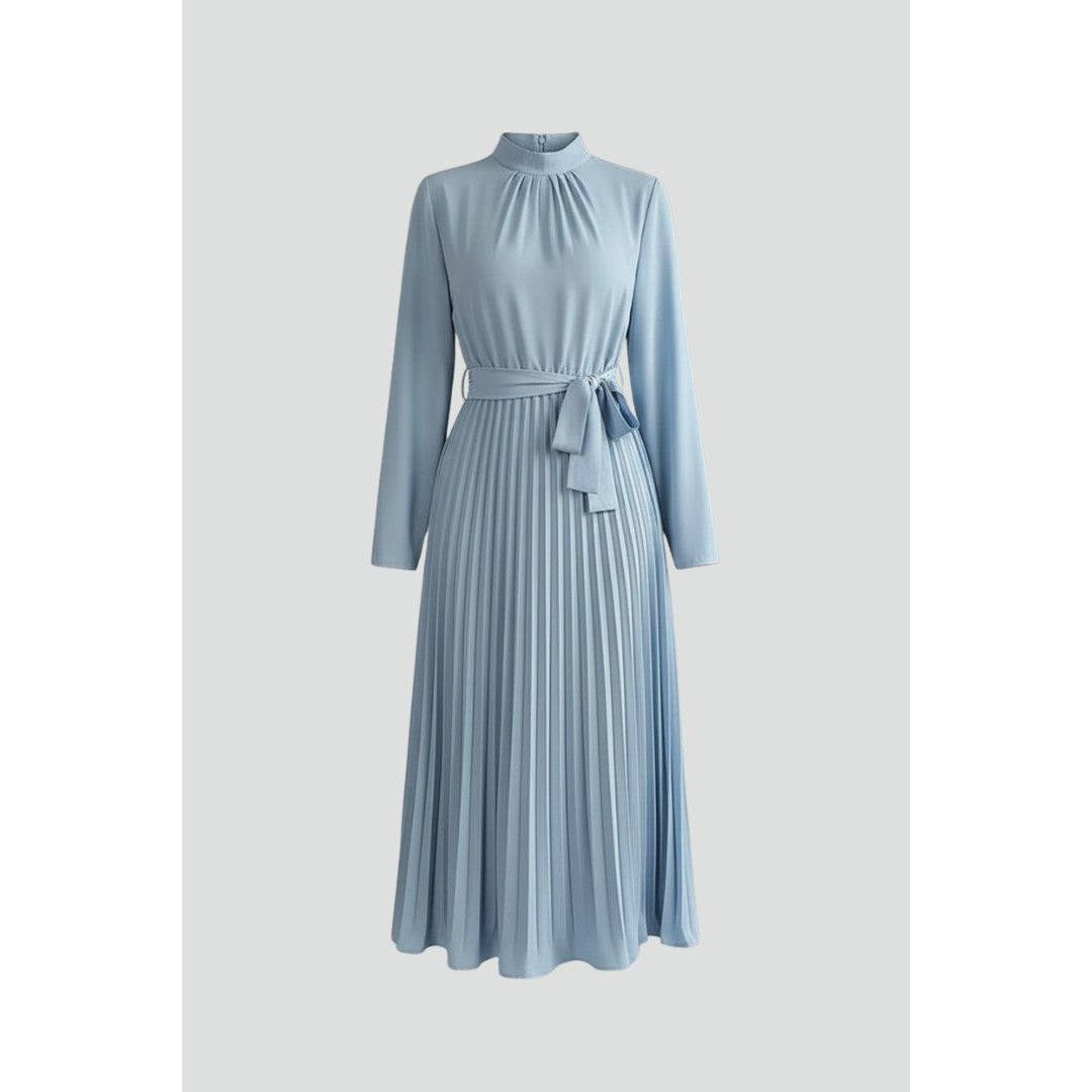 Woman wearing the Felix women's pleated dress, front view