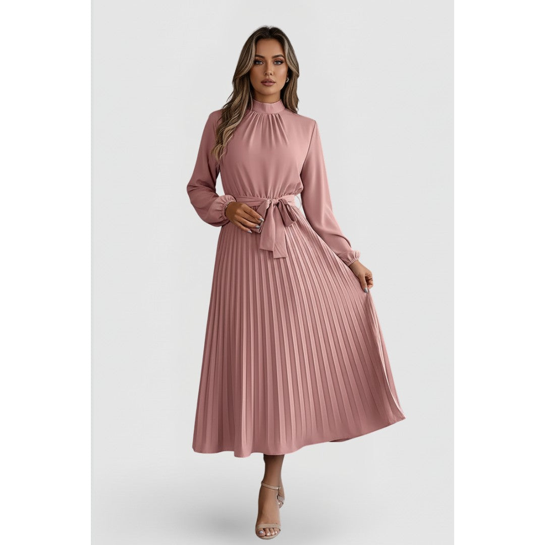 Woman wearing the Felix women's pleated dress, model view