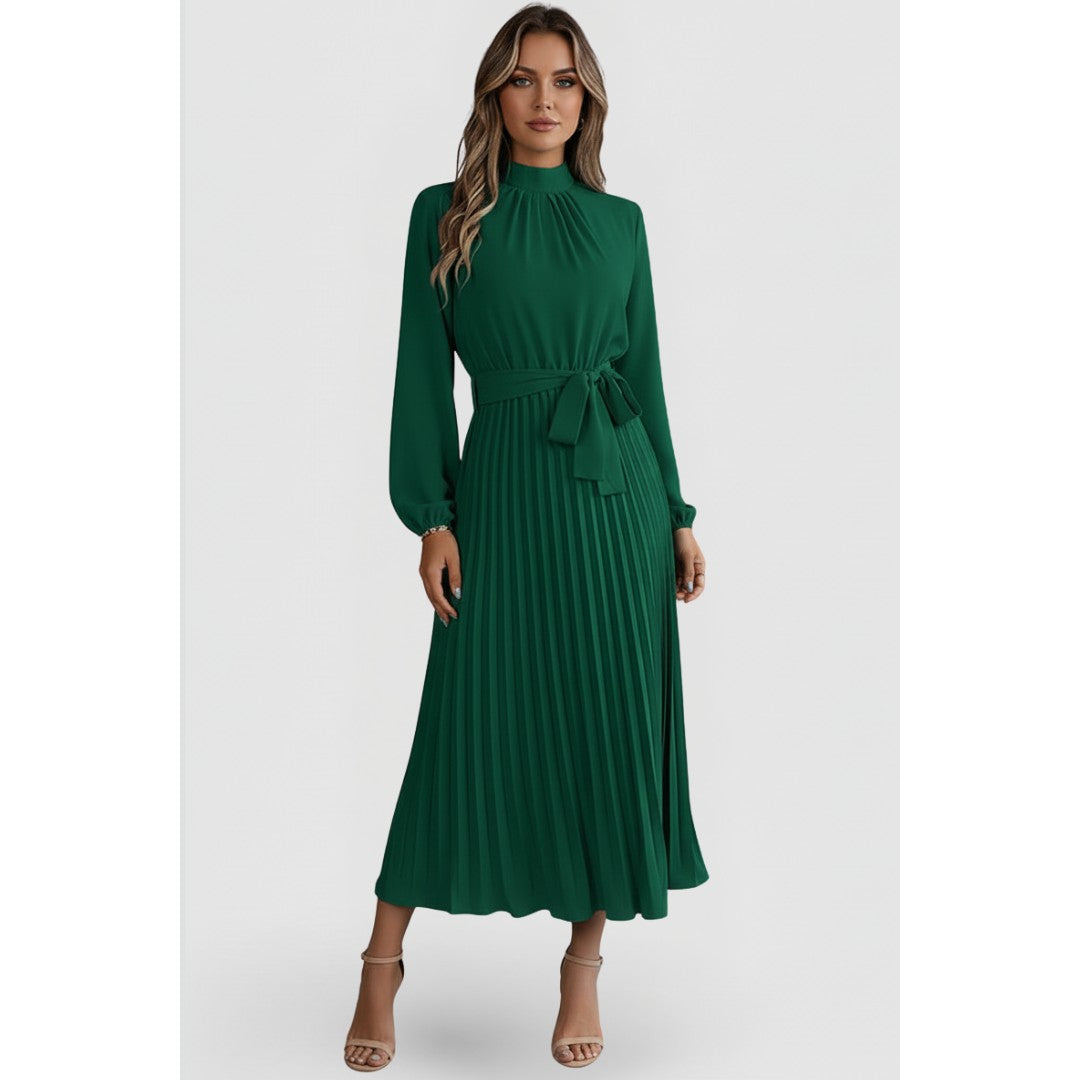 Woman wearing the Felix women's pleated dress, side view