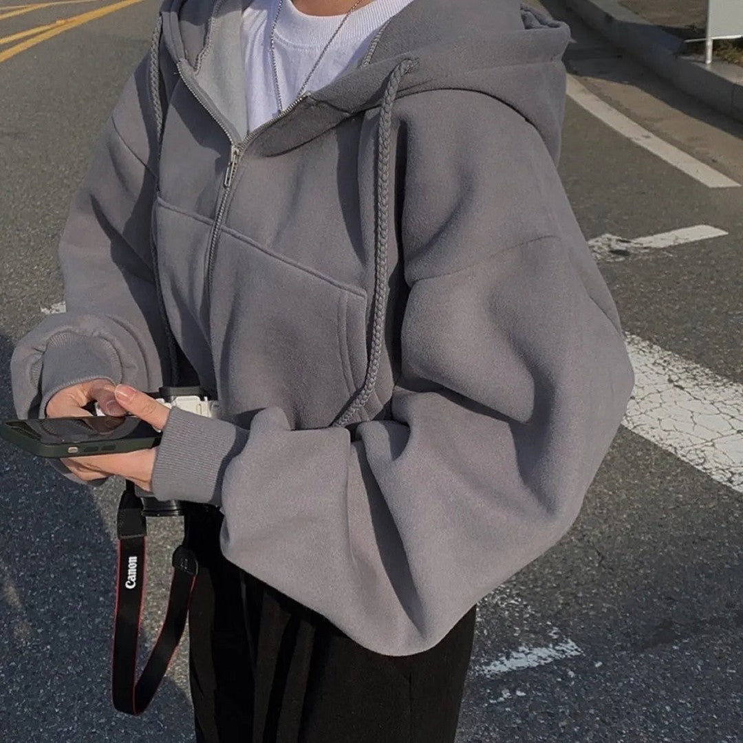 Woman wearing the Fiona women's zip-up sweatshirt, back view
