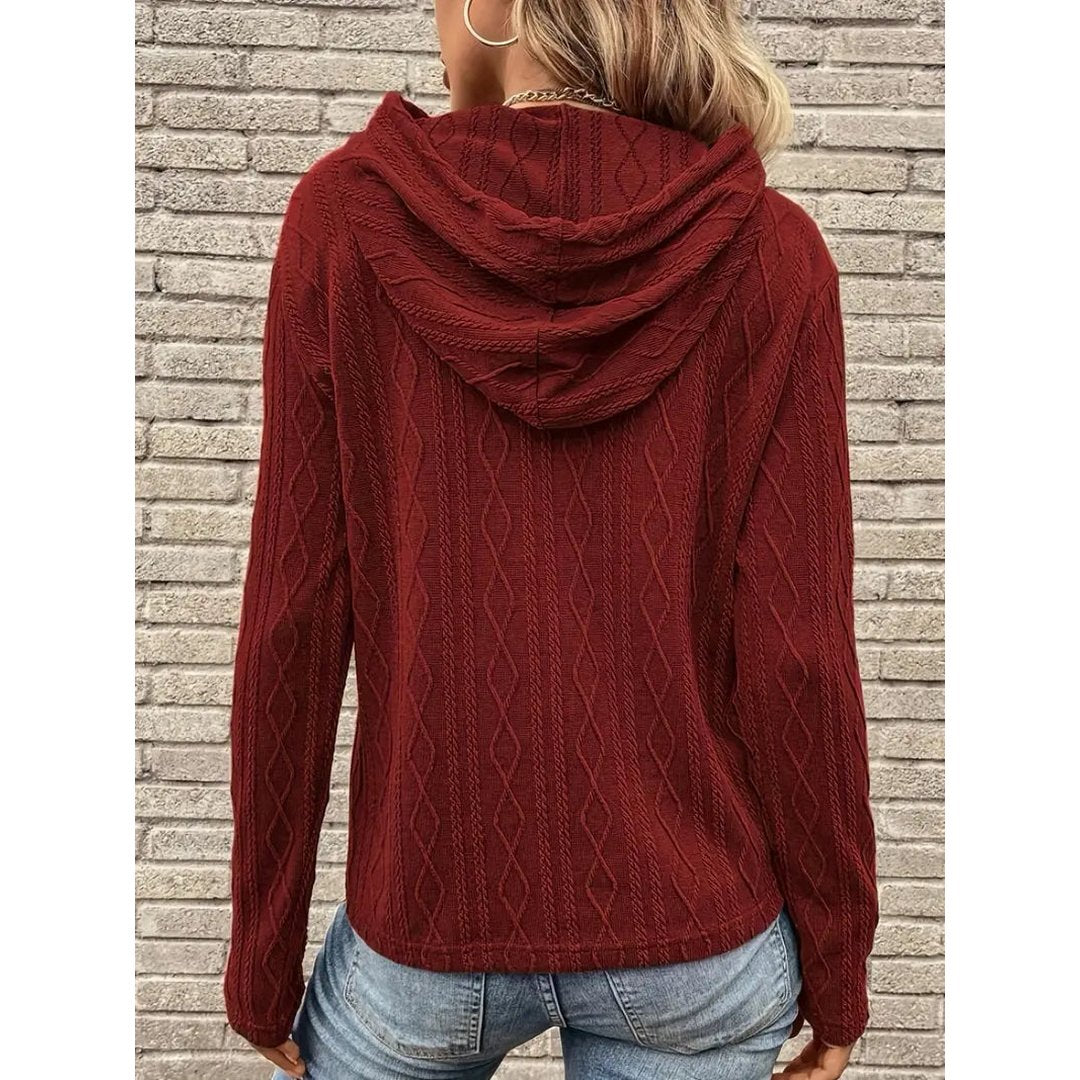 Woman wearing the Flora women's hooded hoodie, flatlay view