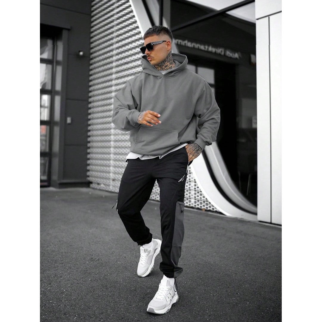Man wearing the Florian men's solid-color cotton streetwear hoodie, detail view