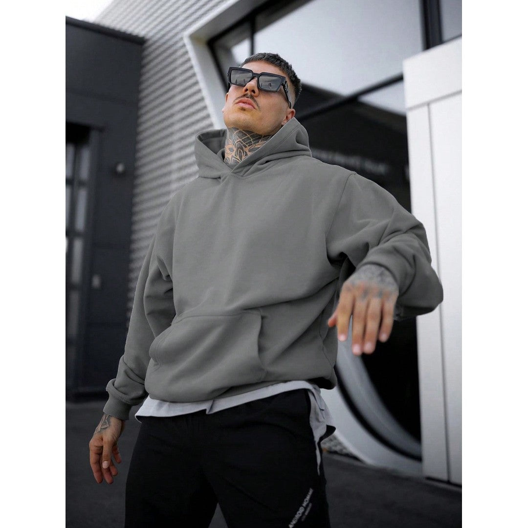 Man wearing the Florian men's solid-color cotton streetwear hoodie, front view