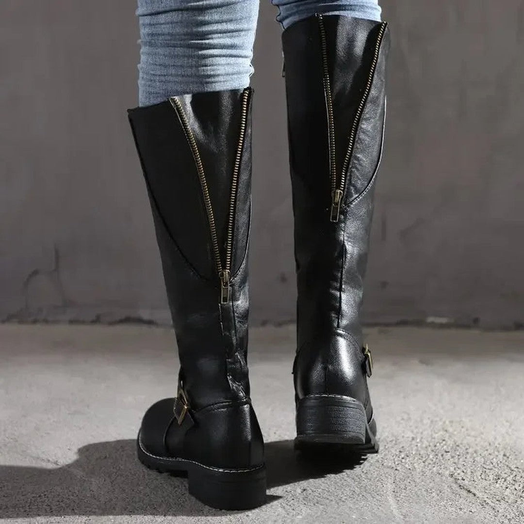 Woman wearing the Frankie women's leather elegant boots, front view