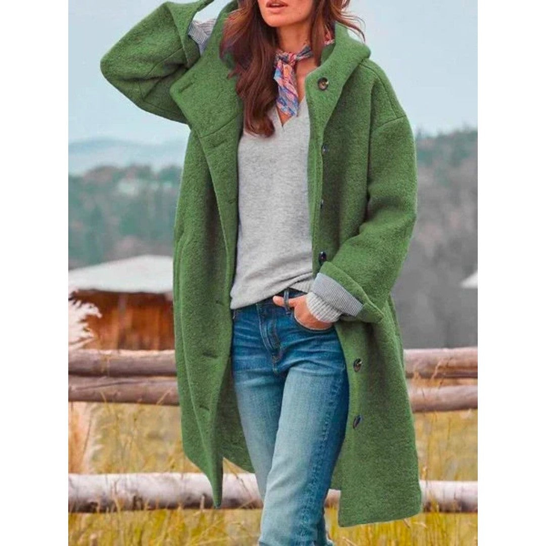 Woman wearing the Freya women's hooded coat, model view