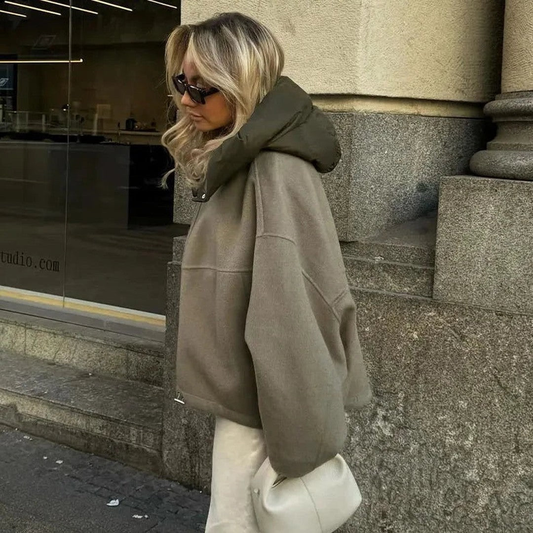 Woman wearing the Gaia women's relaxed hooded jacket, detail view