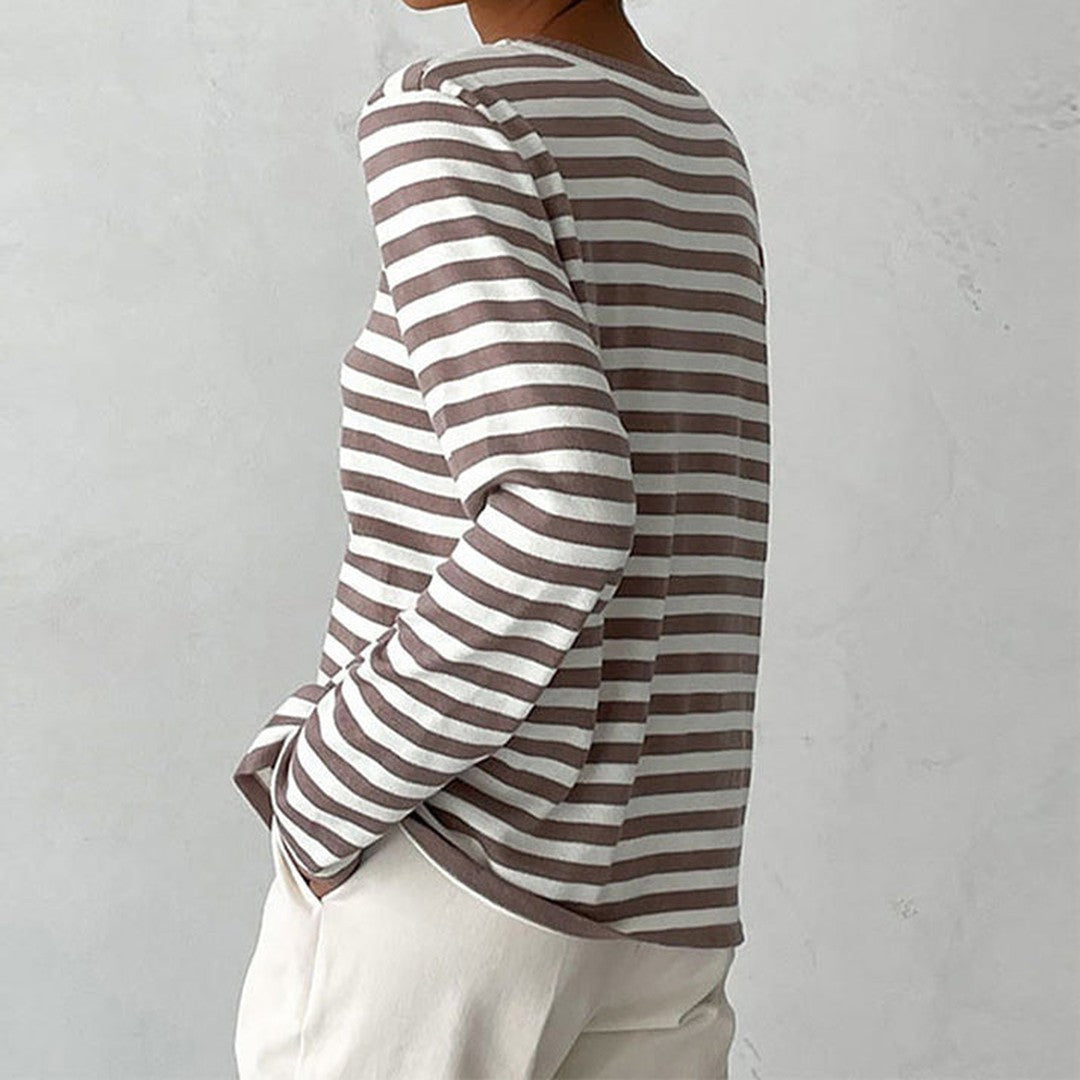 Woman wearing the Georgia women's striped shirt, back view
