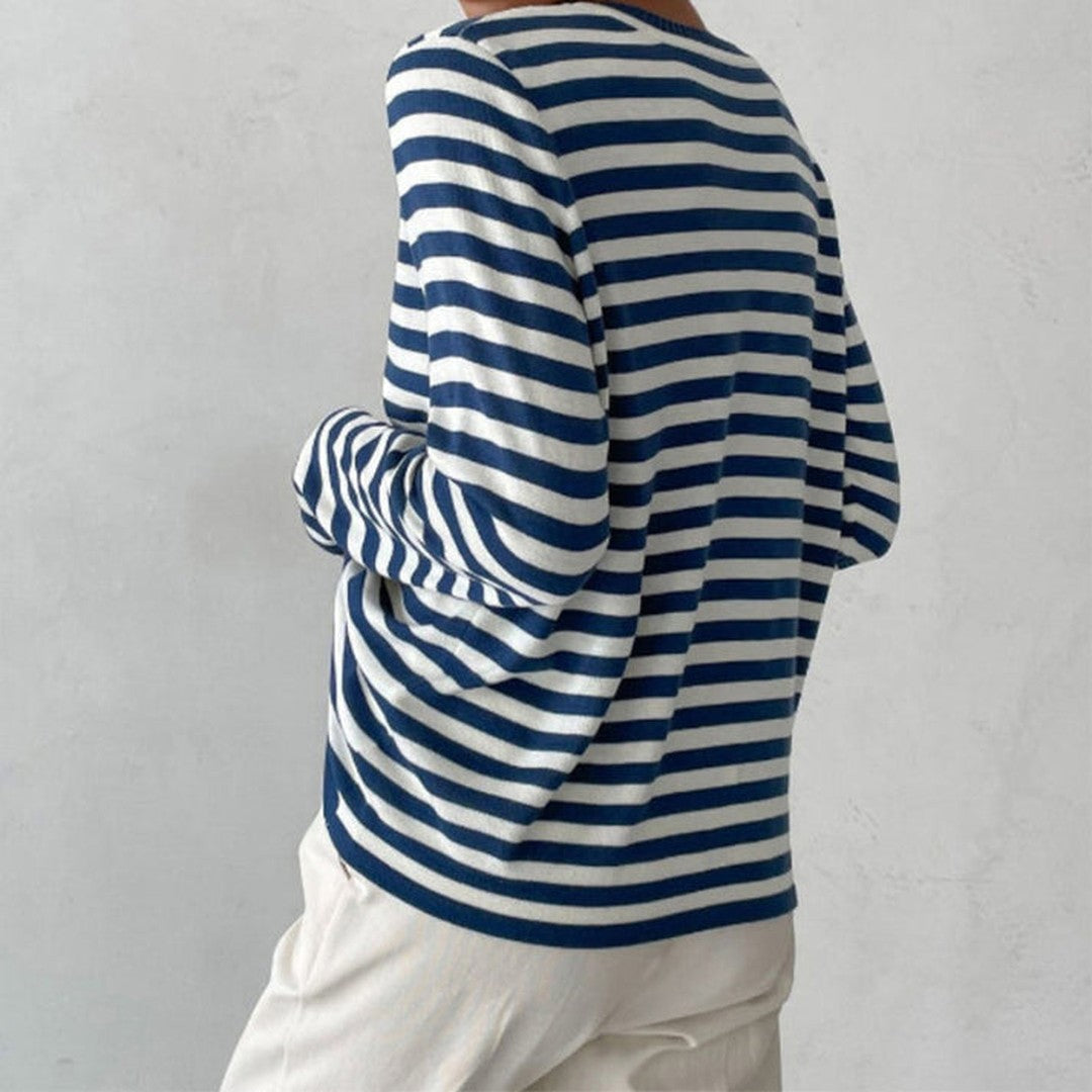 Woman wearing the Georgia women's striped shirt, side view