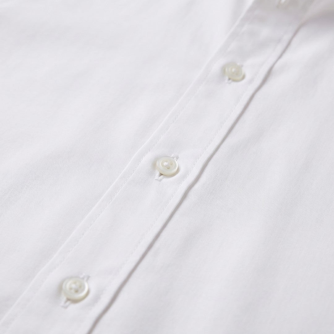 Man wearing the Grayson men's slim-fit polyester long-sleeve shirt, model view