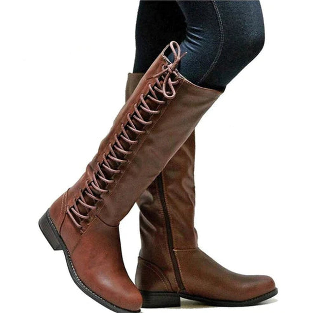 Woman wearing the Greer women's elegant boots, back view