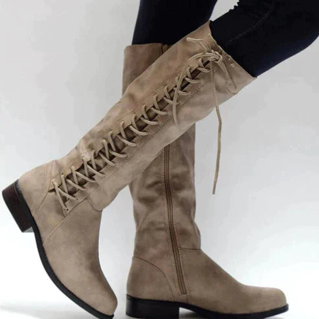 Woman wearing the Greer women's elegant boots, side view