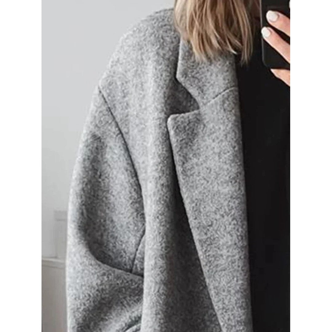 Woman wearing the Hailey women's tailored classic coat, side view