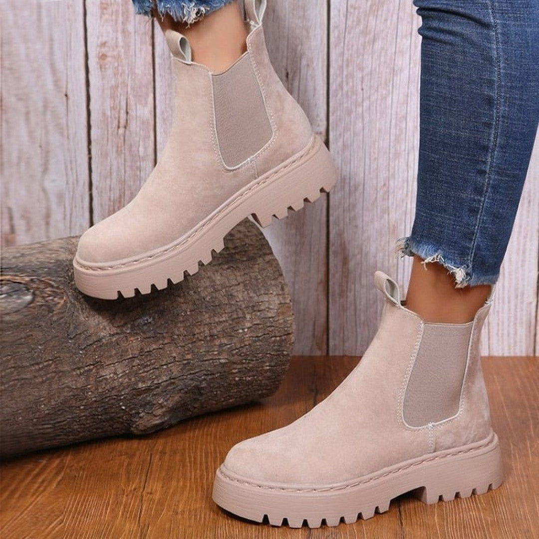 Woman wearing the Halle women's boots, back view