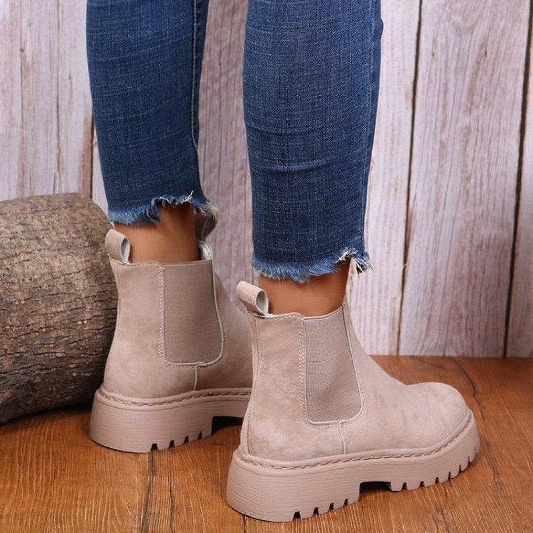 Woman wearing the Halle women's boots, side view