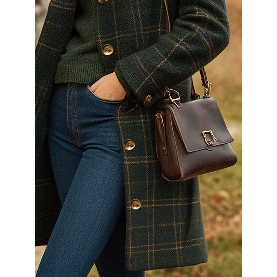Woman wearing the Helene women's slim-fit wool long-sleeve coat, detail view