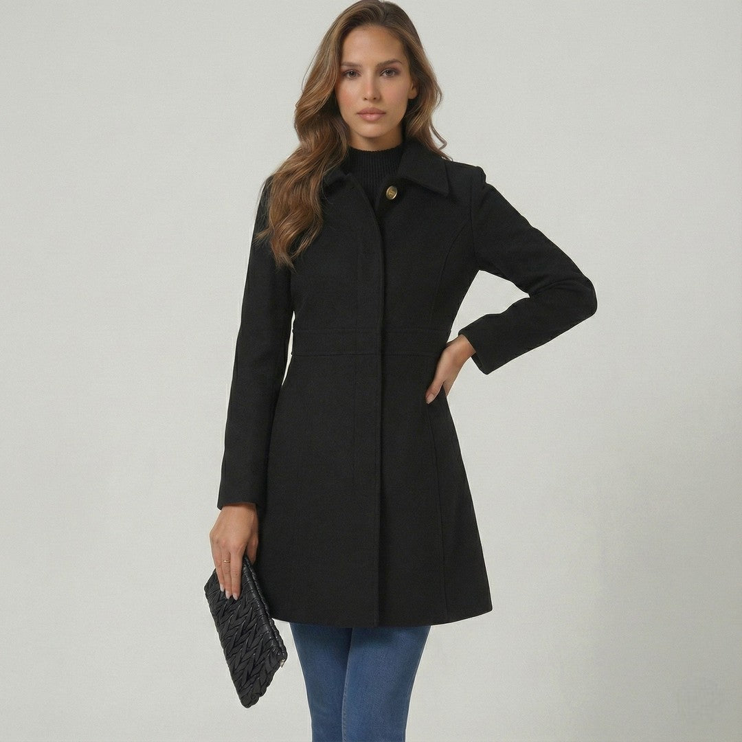 Woman wearing the Ida women's elegant coat, back view