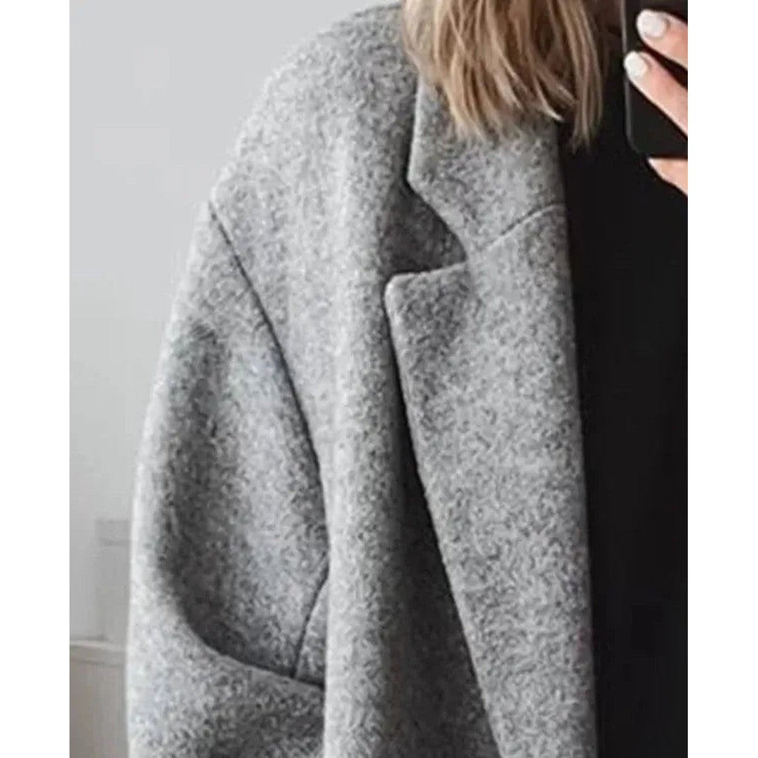 Woman wearing the Ilse women's coat, back view