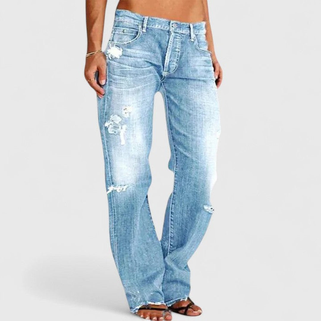 Woman wearing the Imelda women's wide-leg jeans, model view